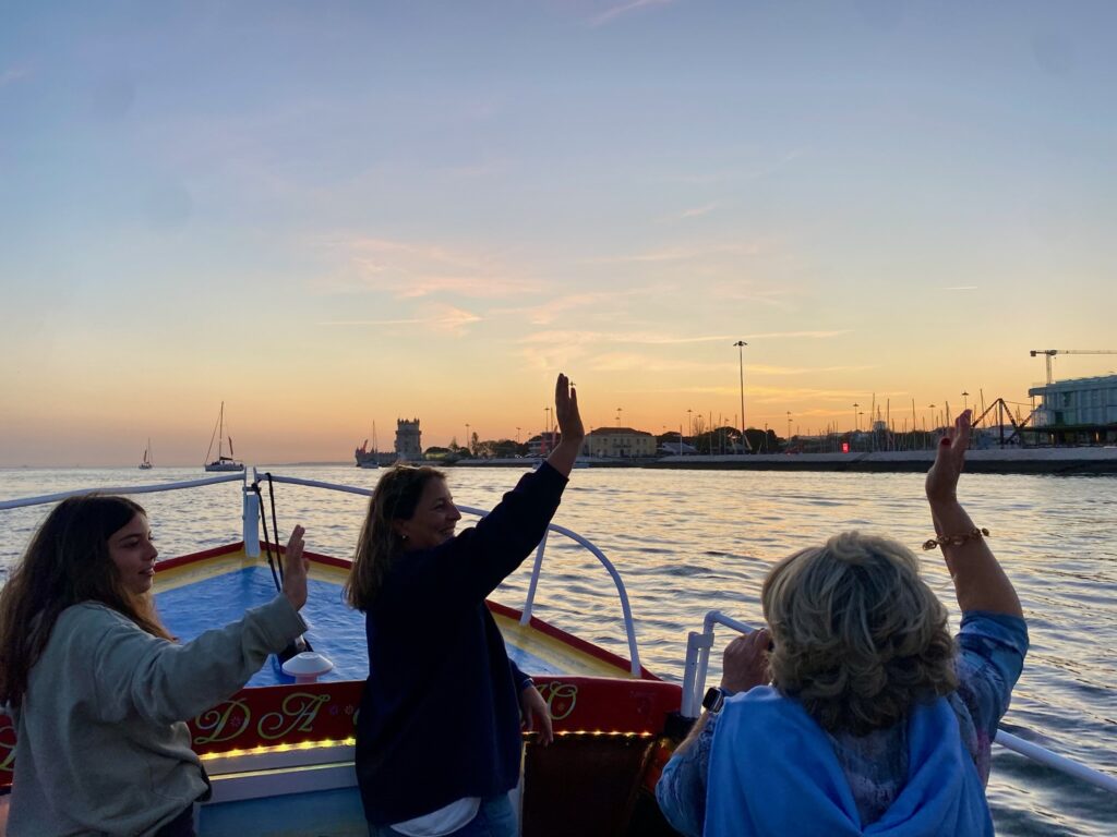 lisbon-boats-fun-waving