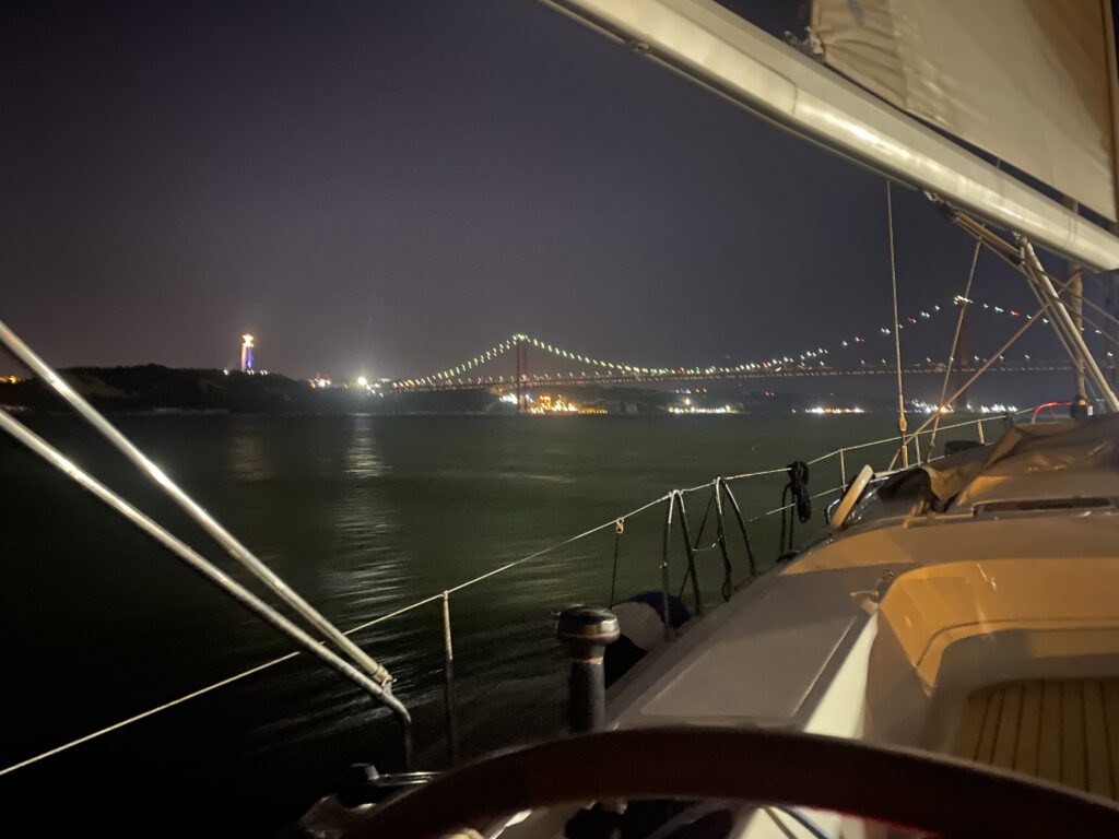 night_sailing_lisbon_tagus_portugal_