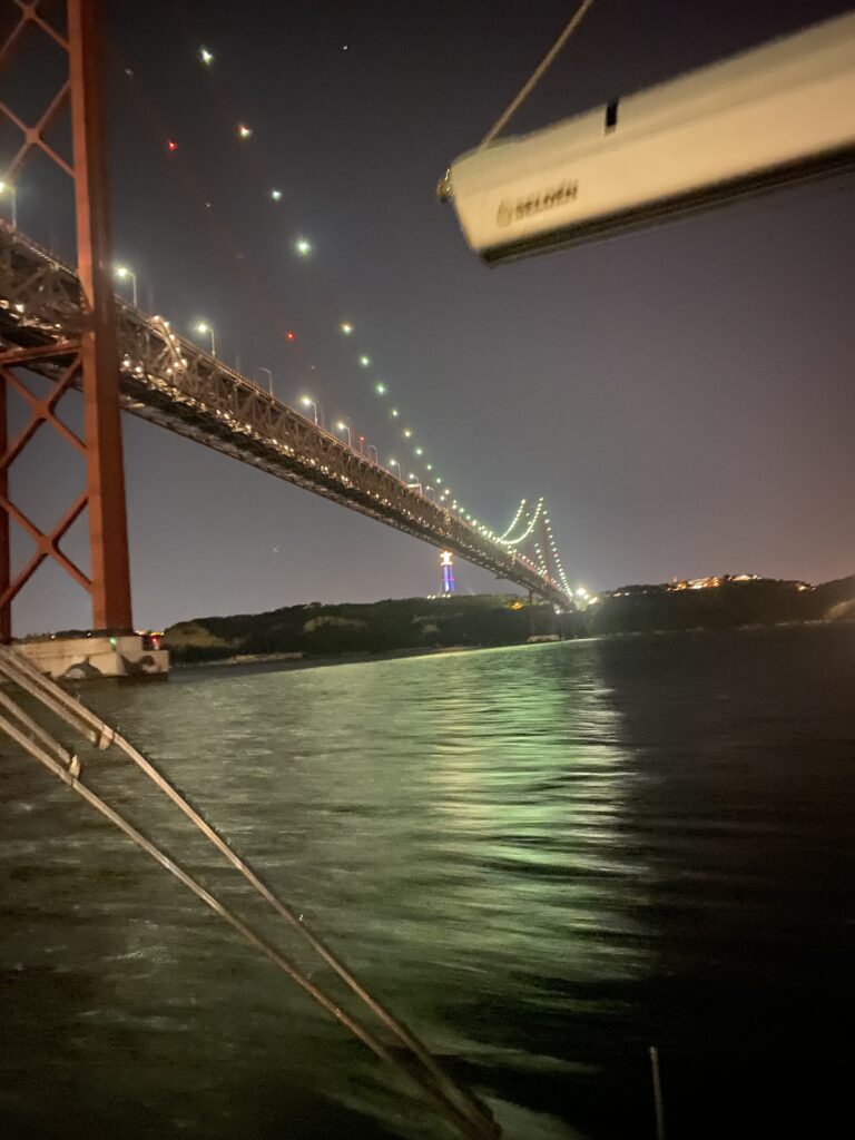 night_sailing_lisbon_tagus_portugal_